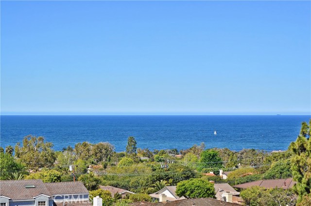 Zoomed ocean and sailboat views