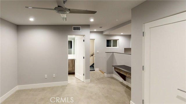 ALTERNATIVE VIEW OF 5TH BEDROOM, ADJACENT FULL BATH AND ACCESS TO ROOFTOP DECK