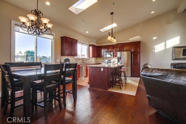 Vaulted ceilings, abundant light (west facing windows and skylights) adorn the great room