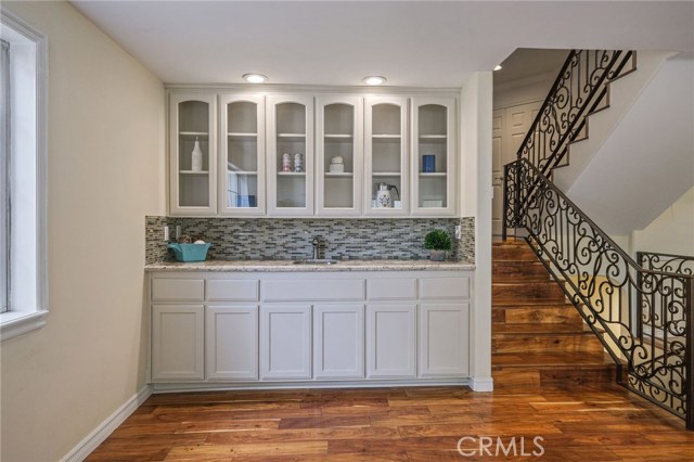 Wet bar and plenty of storage in Family Room
