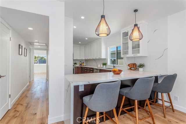 A breakfast bar for casual eating, imbibing, or homework - you pick.