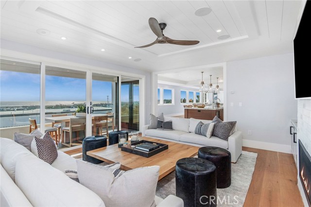 Ocean View Family Room opens to barbecue deck with sliders.