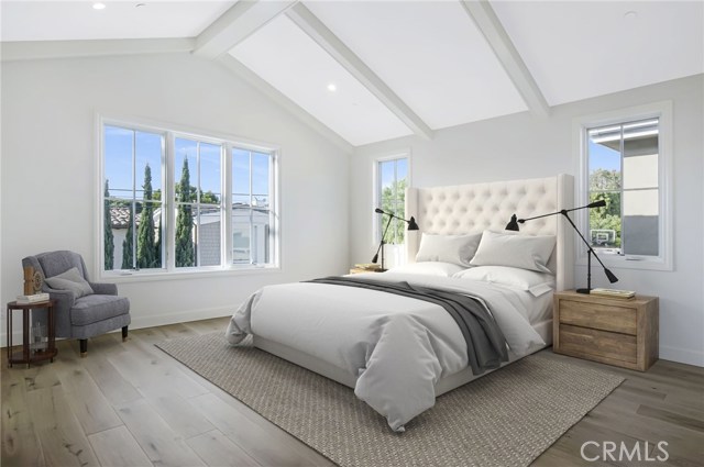 Beautiful master bedroom with vaulted ceilings and bright light.