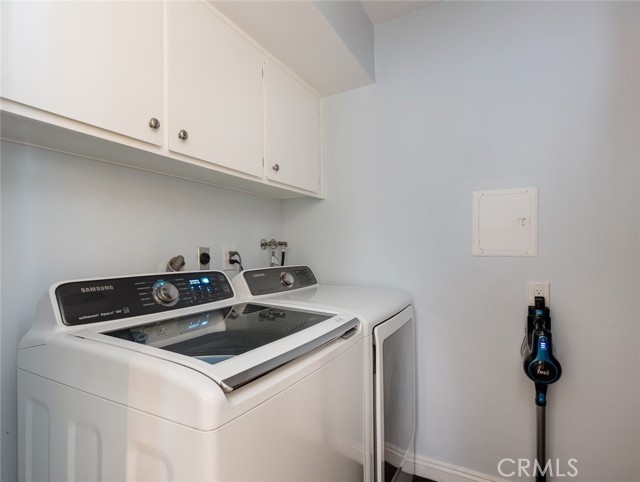 Laundry room...water heater in this room and a storage area