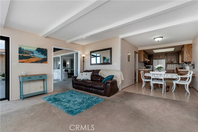 Family room off kitchen and dining area. Family room has panoramic views of city and mountains. View of coast from the kitchen!