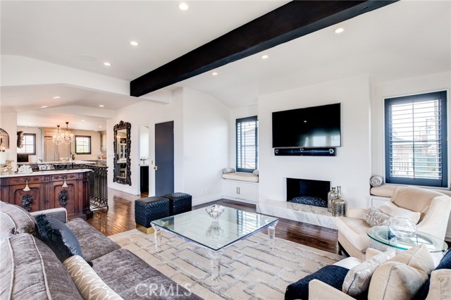 The entire top level is light and bright and includes the living room, dining room, kitchen and a power room.