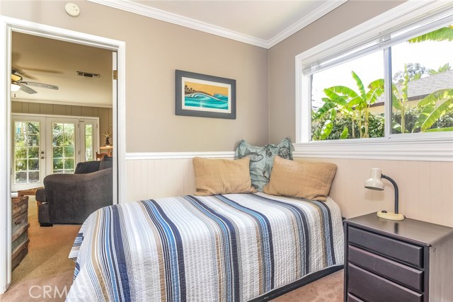 Second Bedroom with Family Room in Background