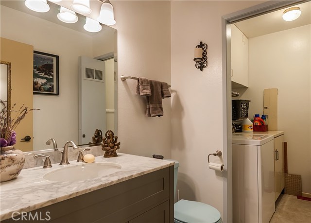 Half bath with connected Laundry room Half bath with connected Laundry room