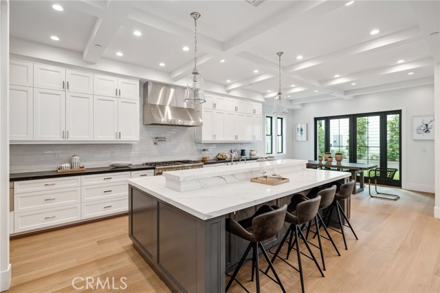 Spectacular, appetizing kitchen showcases exquisite culinary function and design decisions