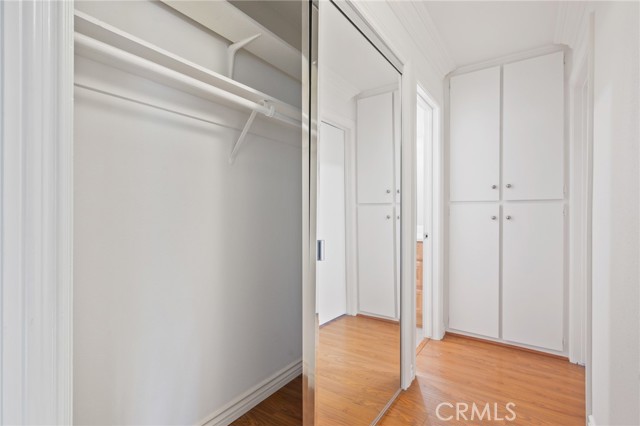 New mirrored closet doors in the hallway.