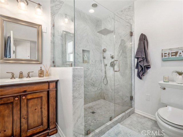 Remodeled hall bath - stunning marble shower.