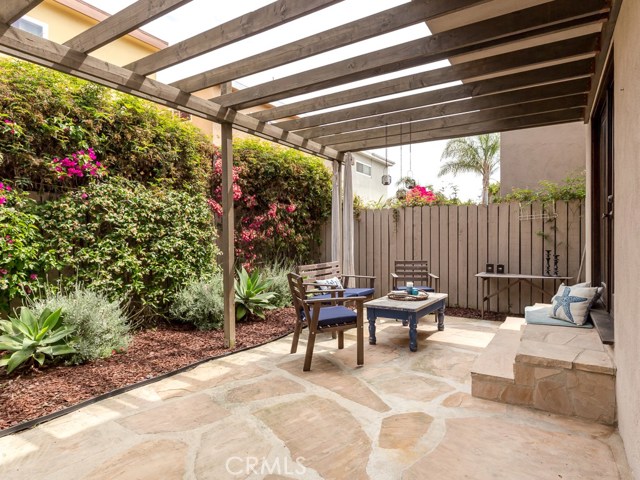 The rear patio with flagstone pavers is a gorgeous place to relax and entertain!