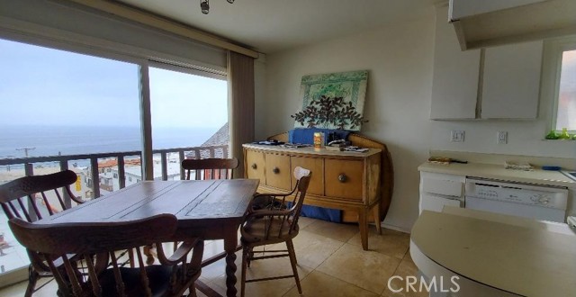 Dining and Kitchen have Travertine Floors and Ocean Views