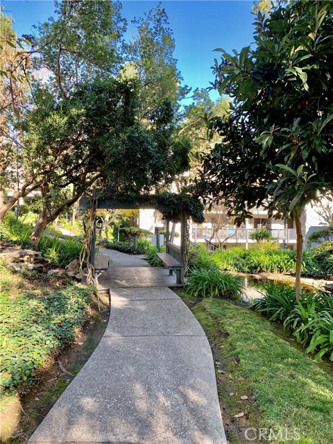 Lushly landscaped gardens and walking paths.