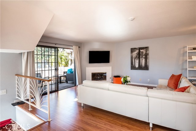 Large living area of this open floor plan, complete with cozy fireplace!