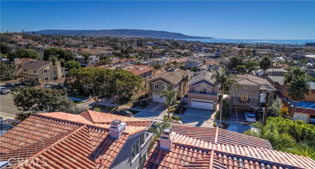 Enjoy amazing ocean view from your kitchen, living room and upper level balcony
