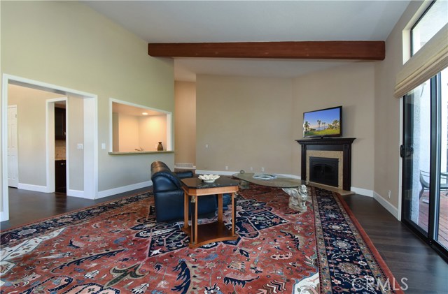 Family Room with fireplace connected to Kitchen and wet bar