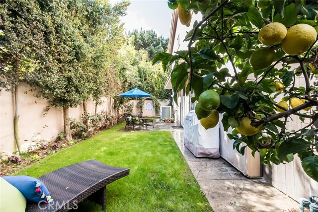 Lush landscaping provides plenty of privacy in your backyard retreat.