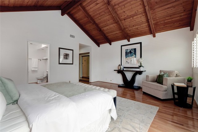 Spacious master bedroom with vaulted ceiling