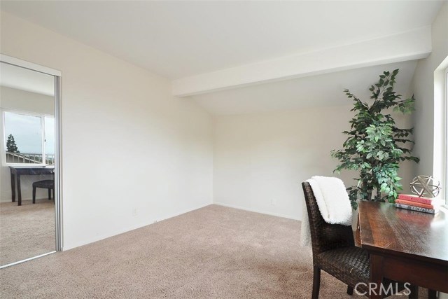 2nd Bedroom has a Harbor View, Neutral Carpeting & Paint with new Mirror Sliding Closet Doors.