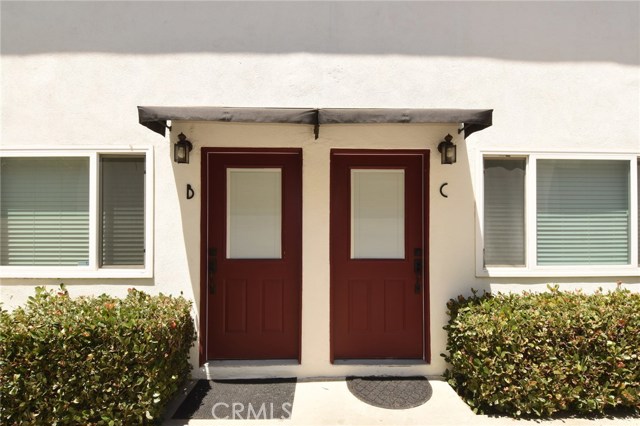 New steel front doors with built-in micro blinds, nice awnings and motion detector security lights.