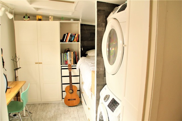 Laundry area is an enclosed patio. This "room" does not have permits and is not included in the living area square footage in county records or on MLS.