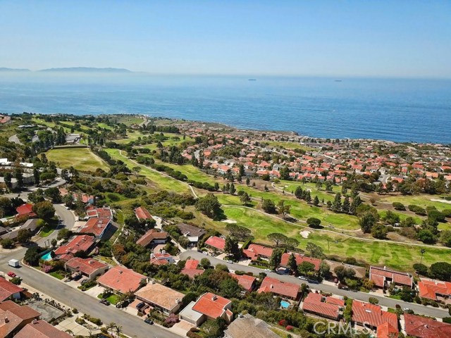 A view of not only the beautiful ocean but a great golf course.