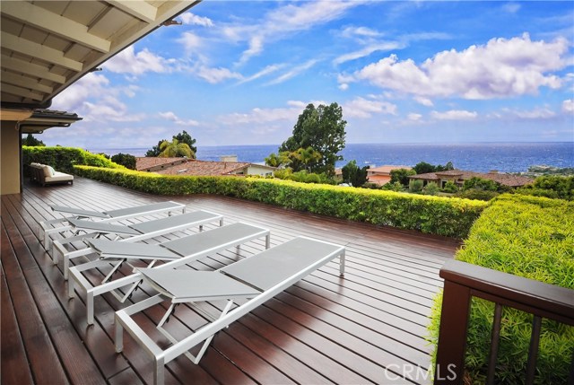 Expansive rear deck, elegant hardwood, Vast 180 degree views from Catalina to the Malibu coast.