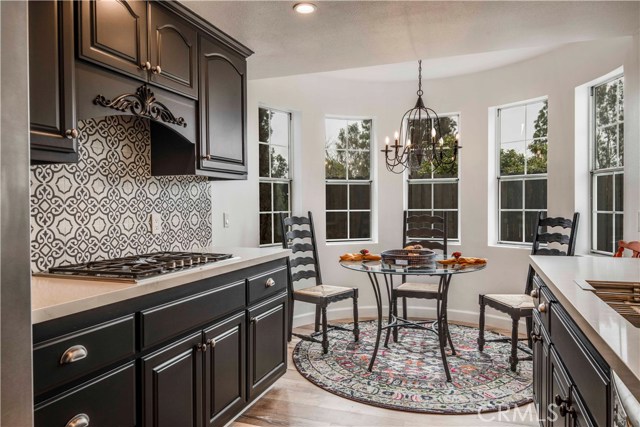 The chef's kitchen boasts quartz counters, and professional grade appliances.