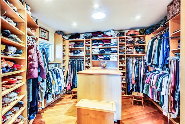 Large, functional walk in closet for the master suite.