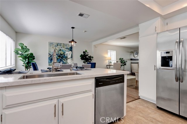 Quartz countertops,  zero radius stainless steel undermount  sink, and we're including the French door refrigerator!