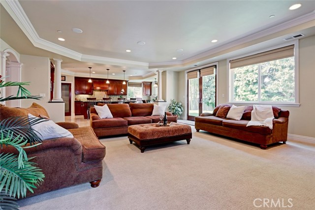 Large family room open to the kitchen and backyard