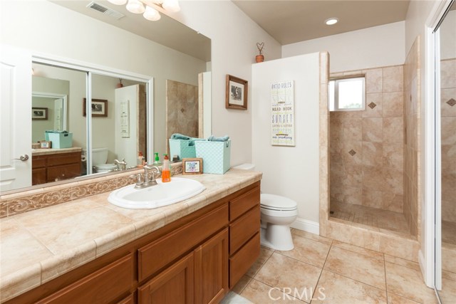 3rd bathroom off the kitchen area and near guest bedroom.