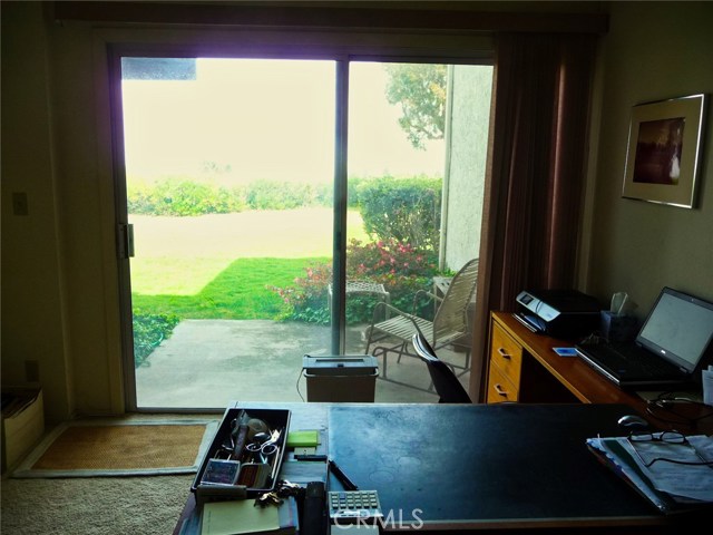Office or 3rd bedroom with outside patio.