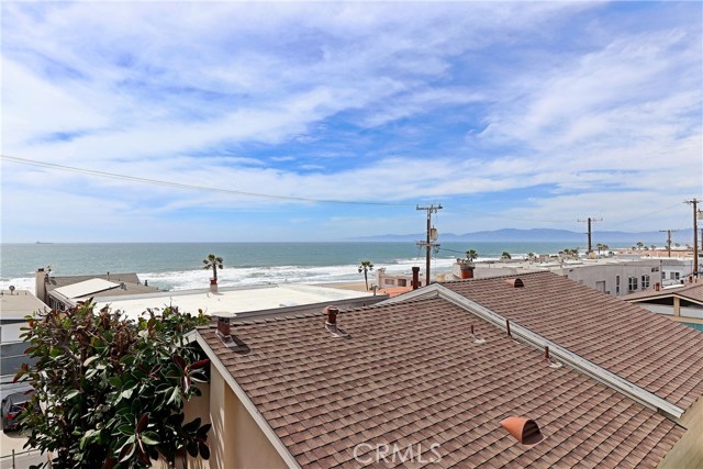 View from rooftop.  Accessible by dropdown attic ladder.  City indicated rooftop height would allow deck or third story. Buyer to verify.