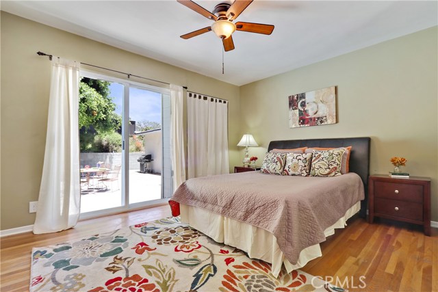 Master bedroom has two closets and direct access to the patio.