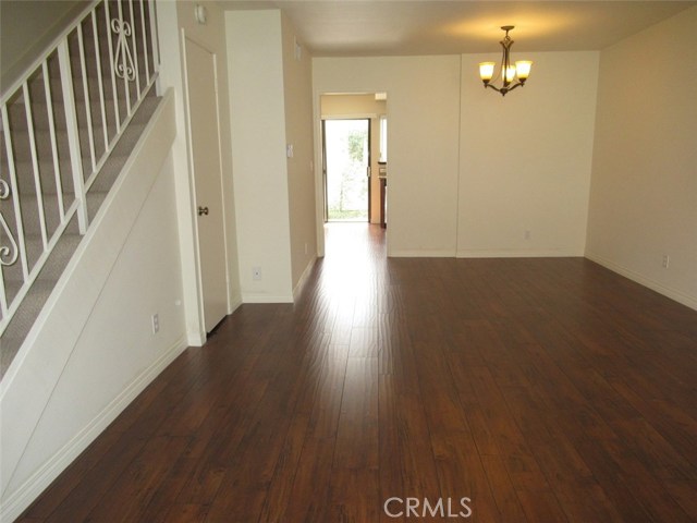 LIVING ROOM WITH DINING AREA.