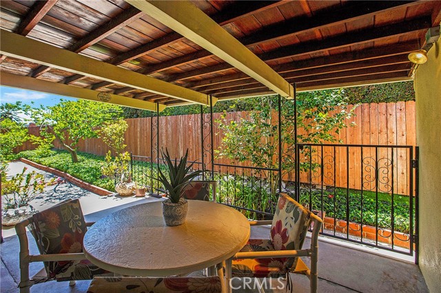 The kitchen/Nook/Dining/Living Room all open to the covered patio perfect for outdoor dining
