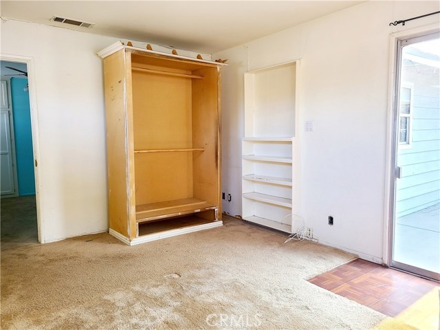 Bedroom #3 w/ Freestanding Closet & Built-In Shelves Bedroom #3 w/ Freestanding Closet & Built-In Shelves