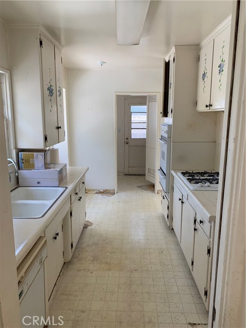 Kitchen Area and Adjacent Laundry Room