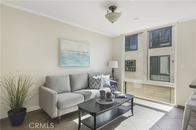 Family Room with floor to ceiling windows.