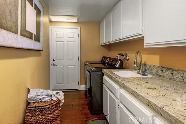 REMODELED LAUNDRY ROOM ON THE FIRST FLOOR.
