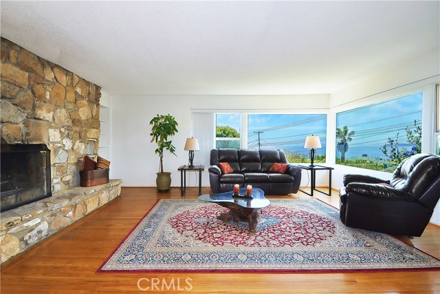 Living room and fireplace with Catalina ocean view
