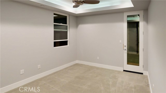 1ST BEDROOM WITH DIRECT DOOR TO BACK YARD, CEILING FAN, LED LIGHTING