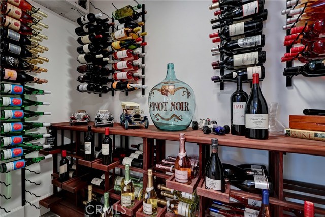 A  refrigerated wine room is housed off of the downstairs family room