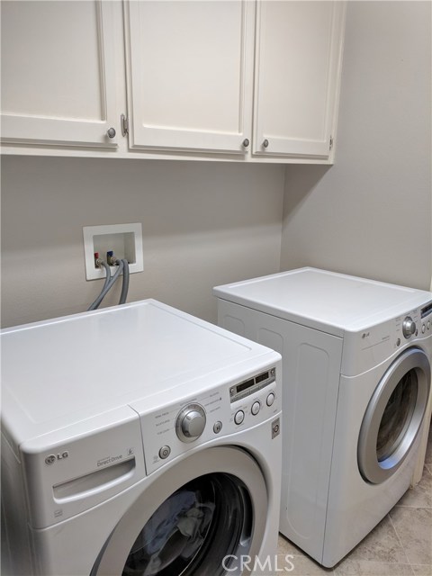 Main Floor Laundry Room with Upper Cabinets