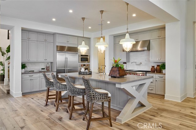 Kitchen open to great room (model home shown).