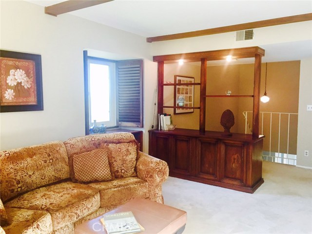 Cozy den with two large windows. Cozy den with two large windows.