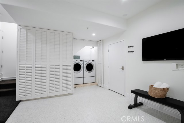 Laundry area and utility closet included in enclosed bonus space.