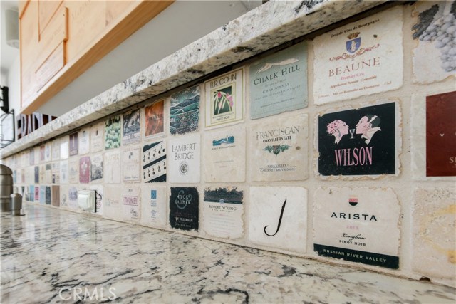 outdoor kitchen - Each tile was hand selected from the wineries the sellers have visited.